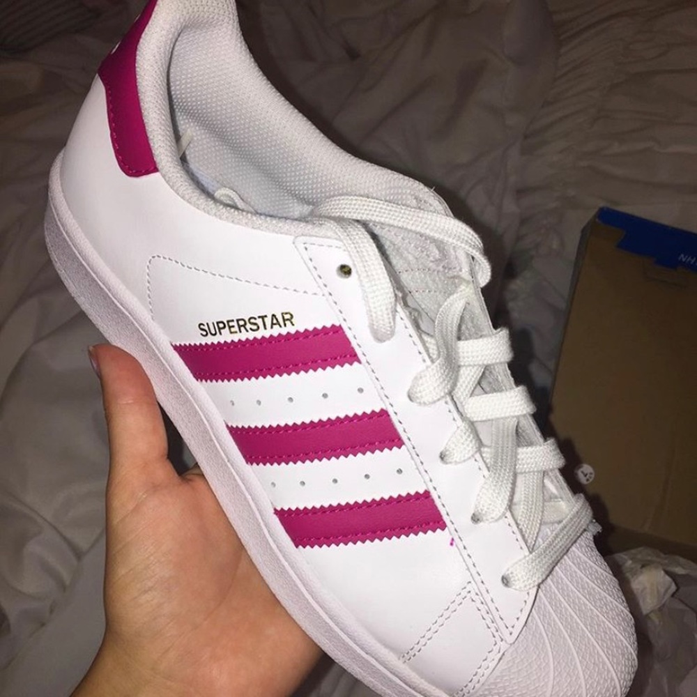 Brand new adidas. Never worn. Perfect condition.